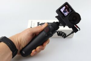 DJI Osmo Action 6 Test Selfie Stick In Hand 1 DJI Osmo Action 6 Test Selfie Stick In Hand 1